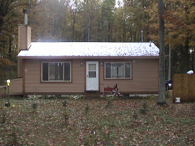 Cottage Exterior pictue of Porcupine Lake Cottage - A Rental in Gaylord, Michigan on 40 acres is available for hunters, snowmobilers, weekend getaways, summer camping, and family vacations. The cozy and clean cottage is available to rent for the weekend, entire week, or monthly rates are available too! Call Brian or Donna Clark at (989) 614-0248